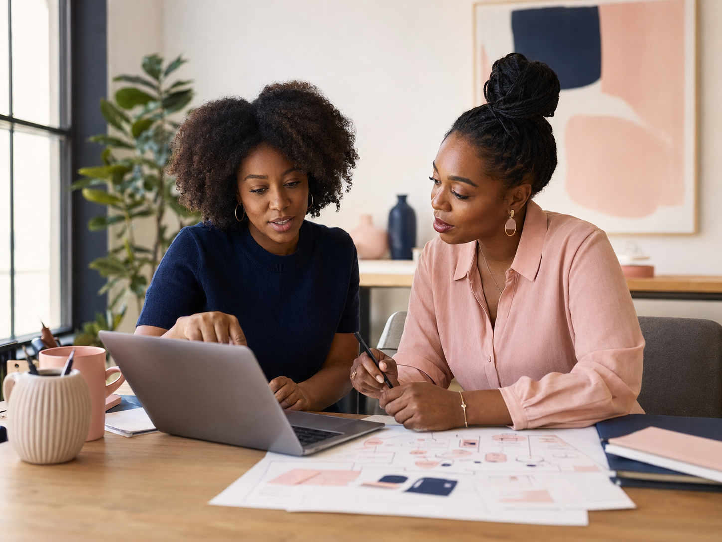Business owner and marketing strategist reviewing a customer journey together